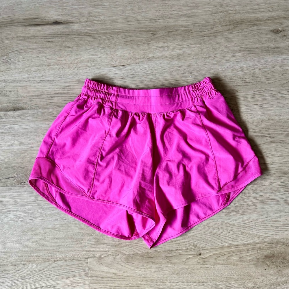 Bright pink lululemon hotty hot shorts